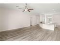 Bright, open floor plan featuring light, modern fixtures and neutral color palette at 6512 N Bruce St, North Las Vegas, NV 89086