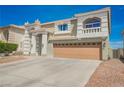 Well-maintained two-story home boasting an attached three-car garage and a clean, modern exterior at 664 Mystic Cliffs Ave, Las Vegas, NV 89183