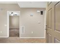 Light and airy foyer with tile flooring, perfect for greeting guests at 6680 Caporetto Ln # 103, North Las Vegas, NV 89084