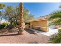 Attractive single-story home with desert landscaping and a tiled roof at 9436 Mount Cash Ave # 101, Las Vegas, NV 89129