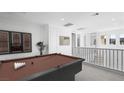 Loft with a billiards table and a view of the mountains at 100 Via Franello, Henderson, NV 89011