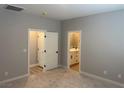 Spacious bedroom with ensuite bathroom featuring dual sinks at 3236 Walker River St, North Las Vegas, NV 89032