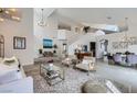 Bright and airy living room with high ceilings, comfortable seating, and elegant decor at 176 Tierra Bonita Ct, Henderson, NV 89074