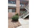 Exterior view of the property featuring balconies and stairs at 5158 S Jones Blvd # 105, Las Vegas, NV 89118