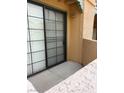 Private outdoor patio with sliding glass door at 5158 S Jones Blvd # 105, Las Vegas, NV 89118