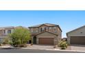 Charming two-story home with desert landscaping and a two car garage in a planned community at 6955 Elysian Valley Ave, Las Vegas, NV 89113