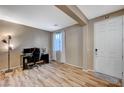 A lovely foyer with wood floors and a white door at 7035 Chestnut Valley St, Las Vegas, NV 89166