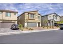 Attractive two-story home with a two-car garage, complemented by well-maintained landscaping at 8316 Gold River Ct, Las Vegas, NV 89113