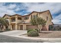 Charming two-story home with a three-car garage, lush landscaping, and great curb appeal at 8431 Jeremiah Grove St, Las Vegas, NV 89123