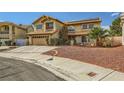 Inviting two-story home with a well-maintained front yard, covered entry, and attached two-car garage at 3381 Biscayne Bay Dr, Las Vegas, NV 89117