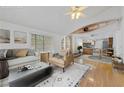 Bright living room featuring hardwood floors, comfortable seating and stylish decor at 5240 Las Cruces Dr, Las Vegas, NV 89130