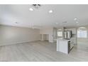 Large living room area with recessed lighting, and open floor plan at 5216 Aztec Heights St, North Las Vegas, NV 89081