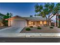 Charming single-story home featuring a well-kept yard, and attached two-car garage at 6316 Bluejay Way, Las Vegas, NV 89146
