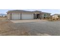 Wide driveway with space for 6 cars, providing ample parking at 3660 Stirrup, Pahrump, NV 89048