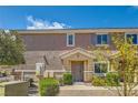 Inviting townhome with desert landscaping, charming covered entryway, and convenient location at 5536 Baccarat Ave # 101, Las Vegas, NV 89122