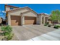 Charming two-story home featuring a spacious two-car garage and desert landscaping for excellent curb appeal at 10172 Fire Skye Ave, Las Vegas, NV 89166
