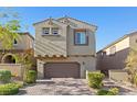 Charming two-story home with stucco exterior, a brick driveway, tile roofing, and an attached two-car garage at 10468 Skye Knoll Ave, Las Vegas, NV 89166