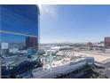 Bright daytime cityscape view showing hotel buildings and pool area at 2700 Las Vegas Blvd # 2809, Las Vegas, NV 89109
