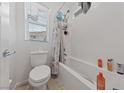 Bright bathroom features a bathtub with a showerhead and white subway tile surround, offering a clean look at 31 Strada Loreto, Henderson, NV 89011