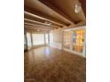 Inviting living room features tiled floors, a bay window and french doors at 1020 Wengert Ave, Las Vegas, NV 89104