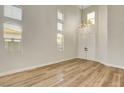 Bright, airy living room featuring wood floors and high ceilings at 3794 Cape Royal St, Las Vegas, NV 89147