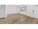 Bright living room with new wood flooring and an abundance of natural light at 429 N 10Th St, Las Vegas, NV 89101