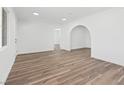 Open living room boasts wood floors and natural light at 429 N 10Th St, Las Vegas, NV 89101