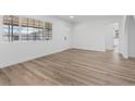 Spacious room with wood floors and lots of natural light at 429 N 10Th St, Las Vegas, NV 89101