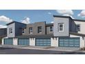 Modern townhome garages with stylish blue doors and contemporary exterior lighting at 9338 Soothing Sea St # Lot 90, Las Vegas, NV 89178