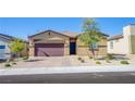 Attractive single-Gathering home showcasing desert landscaping, a brick driveway, and welcoming entrance at 10281 Sequoia Falls Pl, Las Vegas, NV 89149