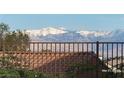 Stunning mountain view from the property, showcasing snow-capped peaks against a clear blue sky at 2764 Leys Burnett Ave, Henderson, NV 89044