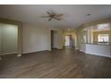 Open concept living room featuring sleek flooring at 4017 Gliding Gulls Ave, North Las Vegas, NV 89084