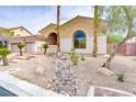 Attractive single-story home with desert landscaping, rock features, and a well-maintained exterior at 4624 Leon De Oro Dr, Las Vegas, NV 89129