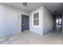 Hallway entrance featuring unit number 2099 with a welcome mat and clean hallway at 6955 N Durango Dr # 2099, Las Vegas, NV 89149