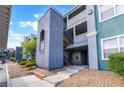 Exterior staircase leading to upper-level units in this condominium community at 6955 N Durango Dr # 2099, Las Vegas, NV 89149