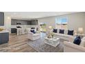 Bright, open-concept living room with modern decor and natural light at 790 Lone Pine Rd, Pahrump, NV 89048