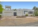 Attractive modern home with well-maintained landscaping and a spacious driveway at 8525 W Verde Way, Las Vegas, NV 89149