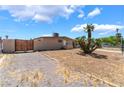 Attractive single-story home with low desert landscaping at 1615 Palora Ave, Las Vegas, NV 89169