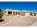 Charming single-story home featuring desert landscaping and a tile roof at 2205 Beacon Ridge Dr, Las Vegas, NV 89134