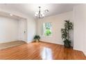 Sun-filled living room boasting hardwood floors, a large window and ample space at 2357 Aztec Ruin Way, Henderson, NV 89044
