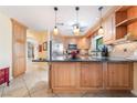 Spacious kitchen with granite countertops, stainless steel appliances, and custom cabinetry at 3221 Palmdesert Way, Las Vegas, NV 89120