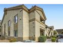 A exterior view of the condo building in a residential neighborhood at 3924 Quiet Pine St # 201, Las Vegas, NV 89108
