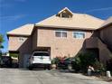 View of a stucco-clad two-story home with a tile roof and off-street parking at 3984 Royal Viking Way, Las Vegas, NV 89121