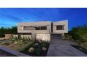 Contemporary home showcasing desert landscaping and a spacious three-car garage at 607 Grand Rim Dr, Henderson, NV 89012