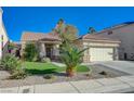 Inviting single-story home with well-manicured front yard and desert landscaping for low maintenance at 8962 Shale Valley St, Las Vegas, NV 89123