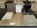Kitchen showcasing cabinet color Benton Burlap, Luxury Vinyl Plank Layton Lake Driftwood, and Sleek Matte Black Faucet at 9242 Soho Sky Ct, Las Vegas, NV 89148