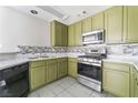 Well-equipped kitchen featuring stainless steel appliances at 1400 Jamielinn Ln # 104, Las Vegas, NV 89110