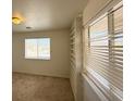 Bright bedroom featuring large windows and built-in shelving at 4330 Turner Blvd, Pahrump, NV 89061