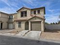 Inviting two-story home featuring neutral stucco, a red tile roof, and a one-car garage at 1144 Black Cherry St, Las Vegas, NV 89142