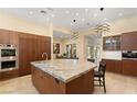 Gourmet kitchen with ample cabinetry, a large island, and modern stainless steel appliances at 1234 Campbell Dr, Las Vegas, NV 89102